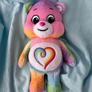 Care Bears “Togetherness Bear” Rainbow Plush – Large (Approx. 18”)